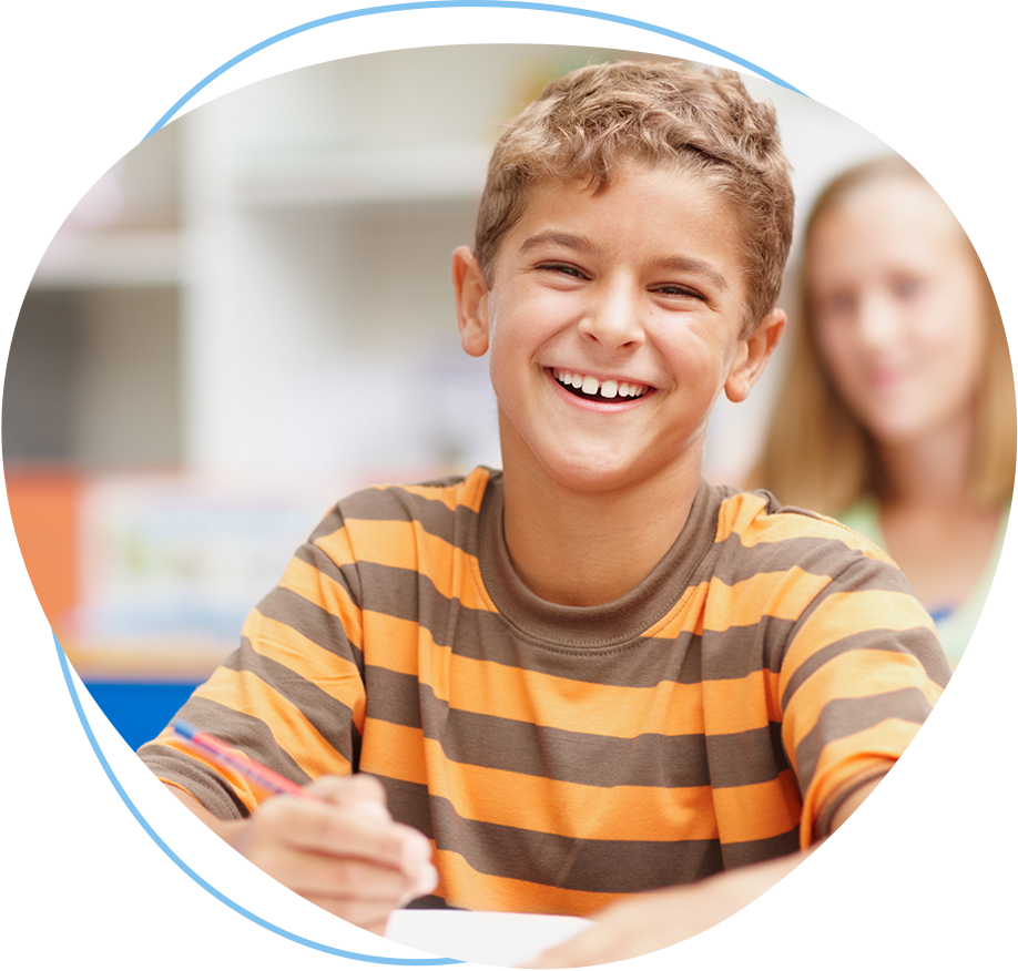 Boy Laughing in Class